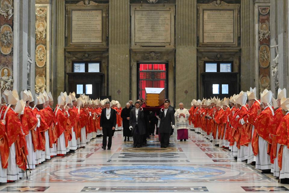 In this image released on Thursday, Jan. 5, 2023, by the Vatican Media news service, the coffin of late Pope Emeritus Benedict XVI is carried prior to the funeral mass for late Pope Emeritus Benedict XVI at the Vatican, Thursday, Jan. 5, 2023. Benedict died at 95 on Dec. 31 in the monastery on the Vatican grounds where he had spent nearly all of his decade in retirement. He was 95.