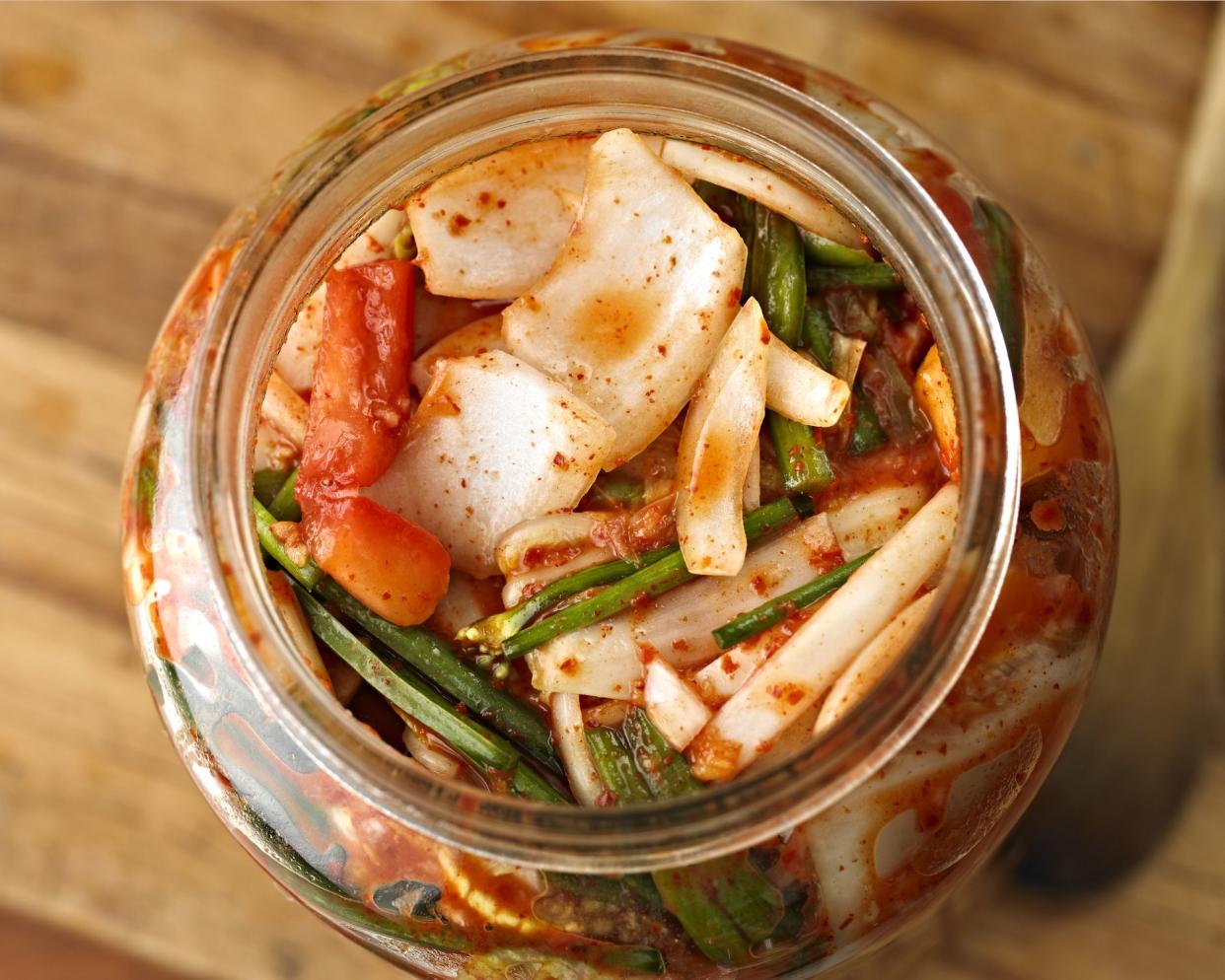 close-up of kimchi in a jar