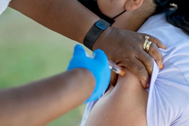 PHOTO: People receive booster shots during a COVID vaccination clinic at Villa Parke in Pasadena, Calif., on July 8, 2022. (Los Angeles Daily News via MediaNews Group via Getty Images)