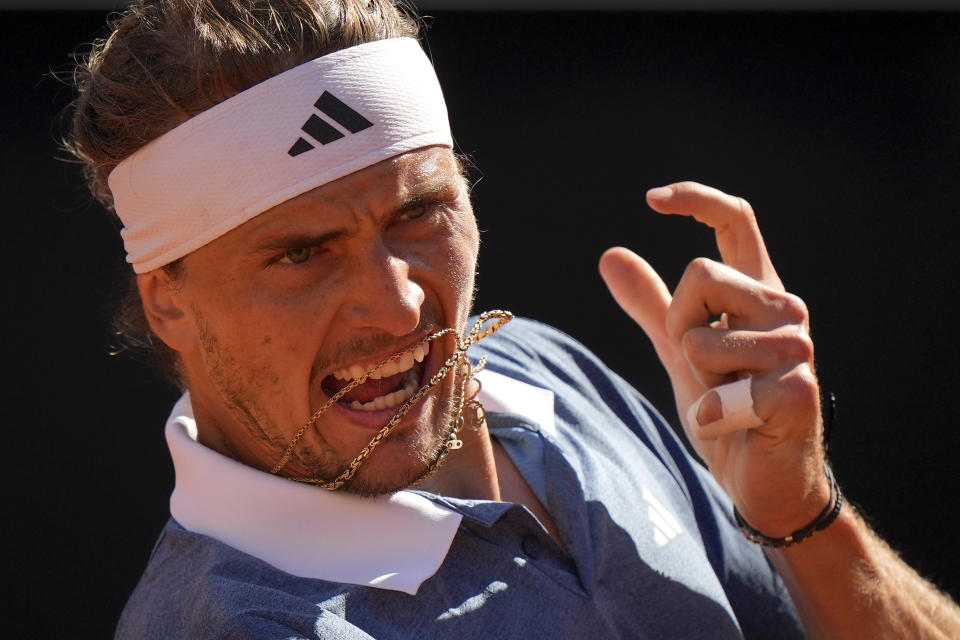 Germany's Alexander Zverev returns the ball to Chile's Alejandro Tabilo during a men's tennis semifinal match at the Italian Open tennis tournament, in Rome, Friday, May 17, 2024. (AP Photo/Andrew Medichini)