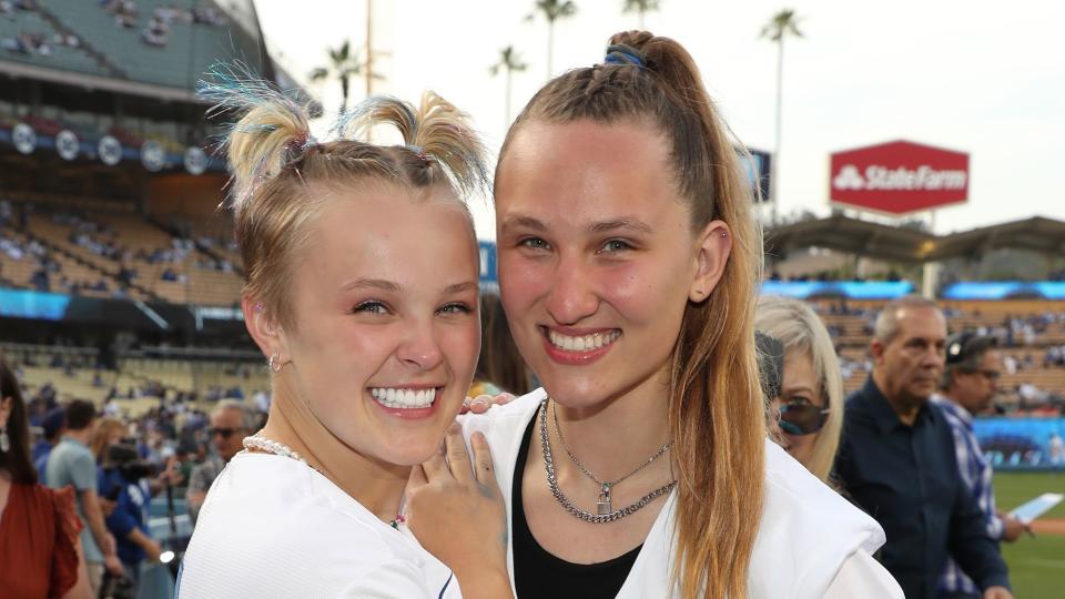 Jojo Siwa and Kylie Prew attend the Los Angeles Dodgers Game at Dodger Stadium on June 03, 2022 in Los Angeles, California