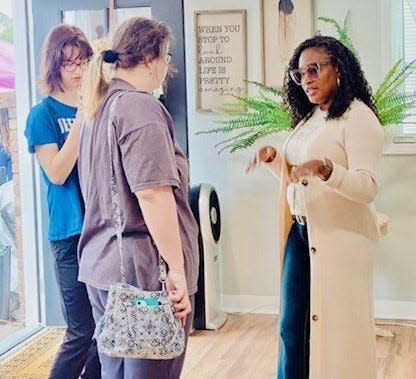 Shakia Fuller, a licensed professional counselor and owner and operator of Self Mental Health, talks with visitors during her first annual Mental Health Expo held last year. Her second annual expo will be held Saturday, May 11, from 1 p.m. to 6 p.m. at the walking track in Wrens.