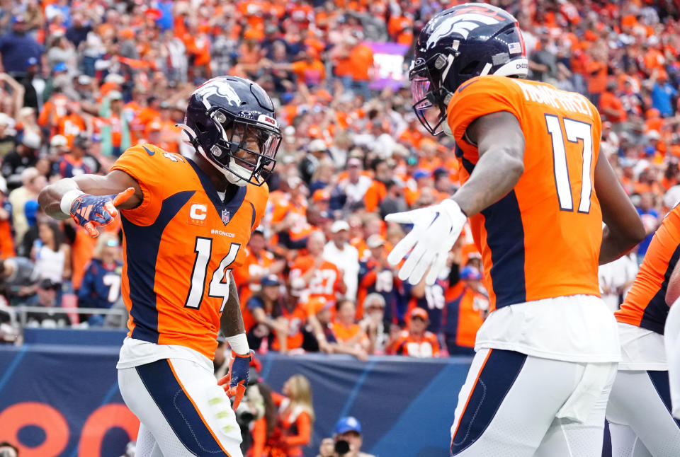 Sep 10, 2023; Denver, Colorado, USA;Denver Broncos wide receiver Courtland Sutton (14) celebrates his touchdown with wide receiver Lil’Jordan Humphrey (17) in the second quarter against the Las Vegas Raiders at Empower Field at Mile High. Mandatory Credit: Ron Chenoy-USA TODAY Sports