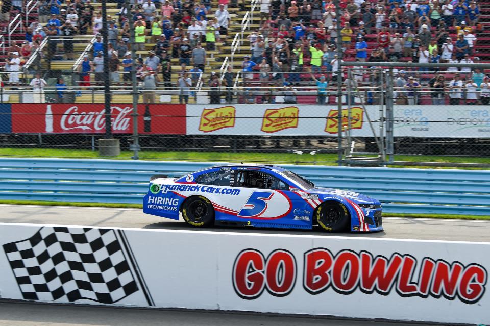 NASCAR Cup Series driver Kyle Larson (5) races to the finish line on the final lap of the Go Bowling at The Glen at Watkins Glen International in 2021.