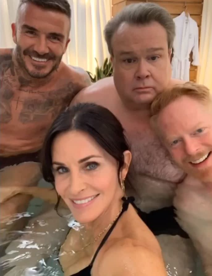 The last season of “Modern Family” looks like it’s shaping up to be an entertaining one! Courteney Cox, one of this season’s many confirmed guest stars, posted a slideshow of on-set photos on Oct. 25, 2019, featuring David Beckham, Eric Stonestreet and Jesse Tyler Ferguson. “Too hot in the hot tub! #modernfamily”, she captioned the snaps.