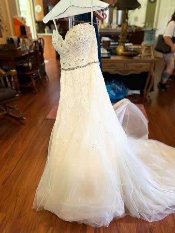 <p>Sandra Deleu</p> Wedding dress for sale at Blue Moon Estate Sales