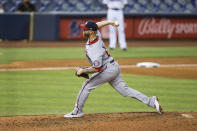 Washington Nationals relief pitcher Justin Miller (60) delivers a pitch during the eighth inning of a baseball game against the Miami Marlins on Thursday, June 24, 2021, in Miami. (AP Photo/Mary Holt)