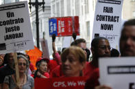 Chicago Teachers Union members picket prior to a Chicago Board of Education meeting on Wednesday, Aug. 22, 2012 in Chicago. The union called for fair contracts with higher pay for its teachers. (AP Photo/Sitthixay Ditthavong)