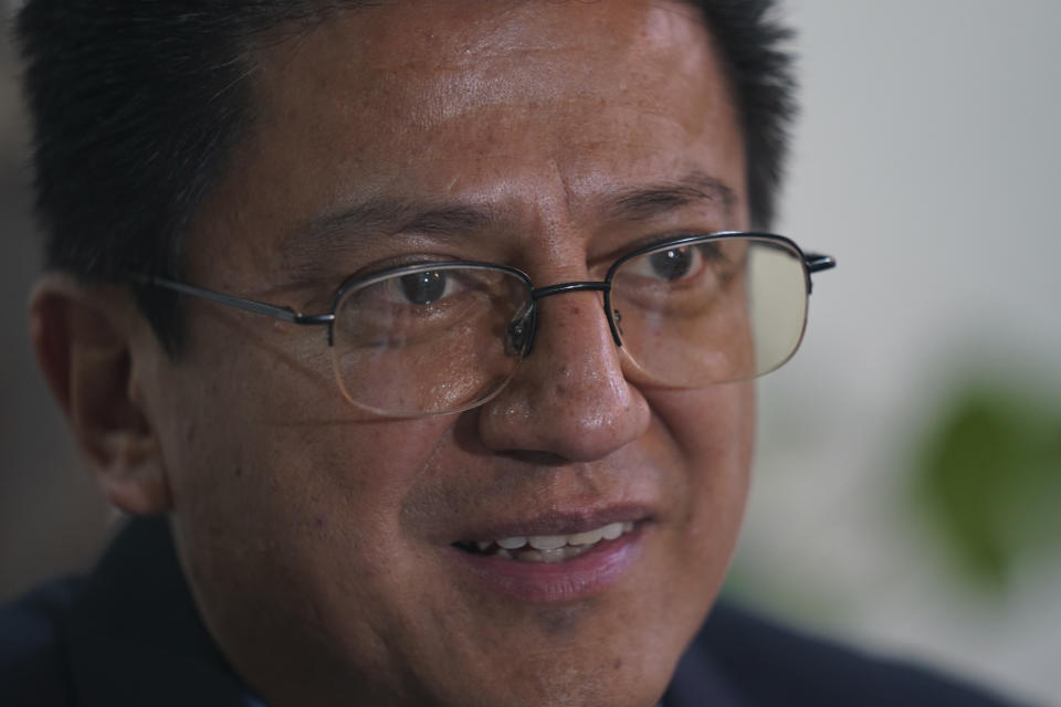 Jorge Atilano Gonzalez Candia, priest and advisor with the Roman Catholic Society of Jesus who was assigned to the case of two slain Jesuit priests in Mexico, gives an interview at his office in Mexico City, Thursday, Sept. 1, 2022. Gonzalez said that investigation, change to local structures and political will are needed to make the changes that will generate peace. (AP Photo/Fernando Llano)