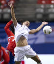 VANCOUVER, CANADA - JANUARY 27: Shannon Boxx #7 of the United States reacts after getting a head on the ball while battling with Fernanda Barrantes #4 of Costa Rica during first half of semifinals action of the 2012 CONCACAF Women's Olympic Qualifying Tournament at BC Place on January 27, 2012 in Vancouver, British Columbia, Canada. (Photo by Rich Lam/Getty Images)