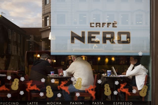 UK - London - Coffee drinkers in Caffe Nero window