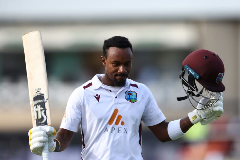 Hundred hero: West Indies batsman Kavem Hodge returns to the pavilion after being dismissed for 120 in the second Test against England at Trent Bridge (Darren Staples)