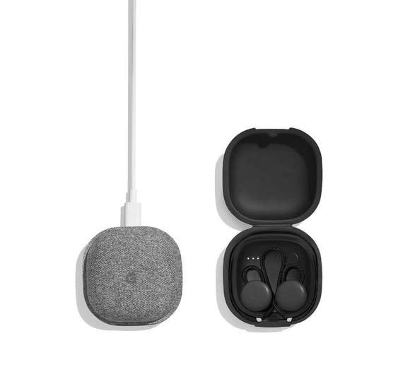 Side by side closed and open Pixel Bud cases, showing the earbuds charging.