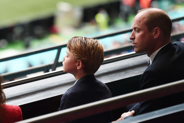 Eamonn McCormack - UEFA/UEFA via Getty Prince George and Prince William watch the Euro 2020 match between England and Germany at Wembley Stadium in June 2021.