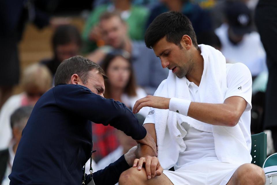 Djokovic retired midway through his Wimbledon quarter-final vs Tomas Berdych: Getty Images