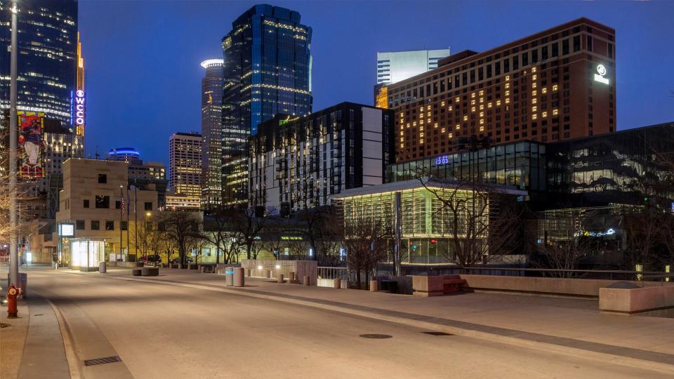 MINNEAPOLIS, MN - APRIL 2020 - "HOPE" is Spelled Using Illuminated Hotel Windows in Quiet Downtown Minneapolis While Corona Virus Stay at Home Orders are in Place.