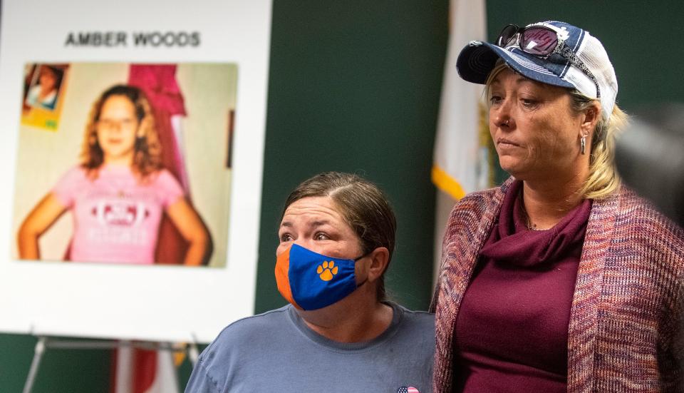 Chrystal Moses, left, and a relative of 16-year-old Amber Woods speak to the media on Dec. 21, 2020, after the Manatee County Sheriff's Office announces arrests in a 14-year-old unsolved cases.