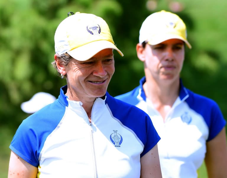 Catriona Matthew of Team Europe leaves the 17th green with Karine Icher with a 1 up lead during the morning foursomes matches of the Solheim Cup, at the Des Moines Golf and Country Club in West Des Moines, Iowa, on August 18, 2017