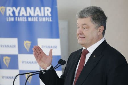 Ukrainian President Petro Poroshenko speaks during a news conference on the signing of the agreement between Ukraine's Boryspil and Lviv airports and Irish carrier Ryanair at Boryspil International Airport outside Kiev, Ukraine March 23, 2018. REUTERS/Gleb Garanich