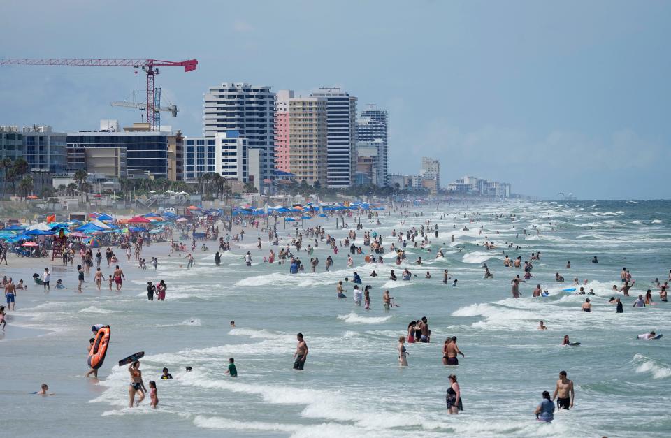 People pack the shoreline in Daytona Beach during Labor Day weekend, Saturday, Sept. 3, 2022.