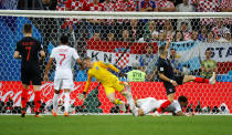 <p>Ivan Perisic puts the ball past goalkeeper Jordan Pickford to level the scores at 1-1 </p>