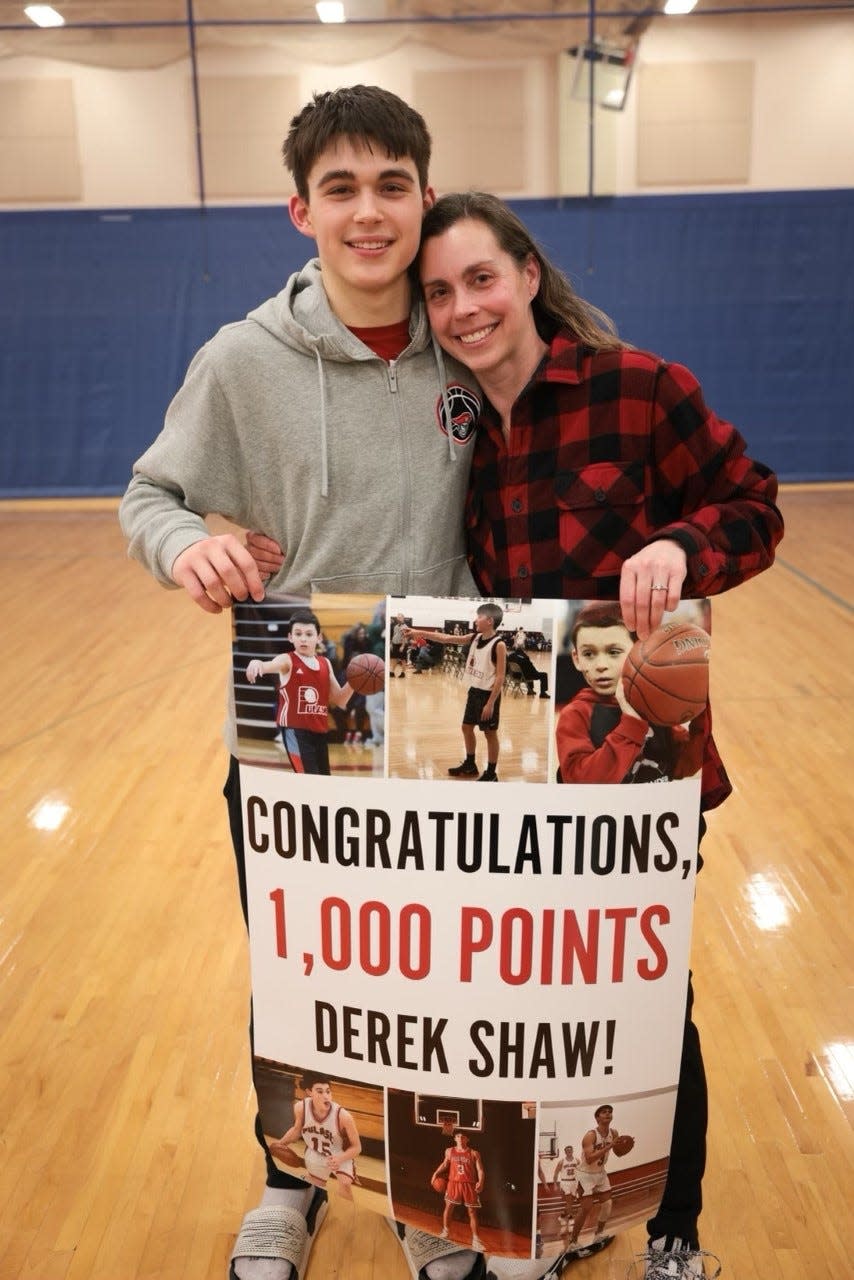 Amy Shaw got to celebrate with her son, Derek, after he scored his 1,000th career point last season.