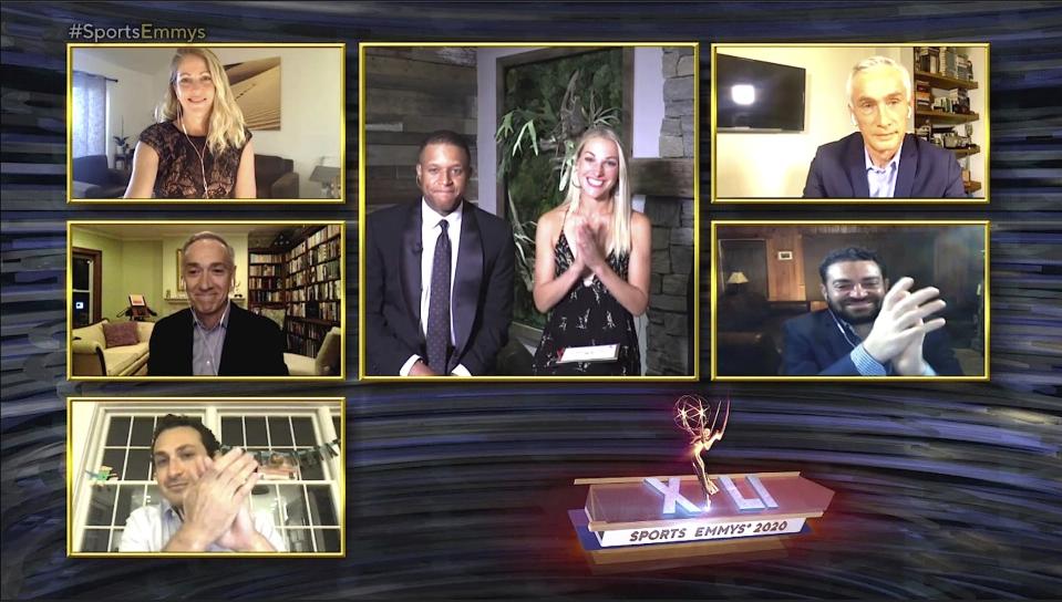 This image released by National Academy of Television Arts & Sciences (NATAS) shows presenters Craig Melvin and Lindsay Czarniak, center, and nominees for outstanding sports journalism, clockwise from top left, Nicole Noren, Jorge Ramos, Josh Fine, Jake Rosenwasser and Greg Amante during the 41st Sports Emmy Awards Ceremony, honoring TV’s best sports coverage. (NATAS via AP)