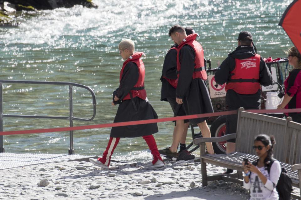 Biebs leads the way as he treks onto his hired jetboat.