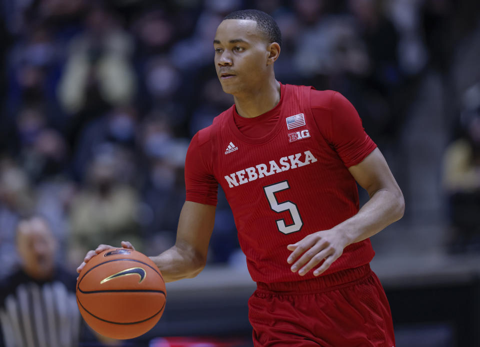 Bryce McGowens brings the ball up the court.