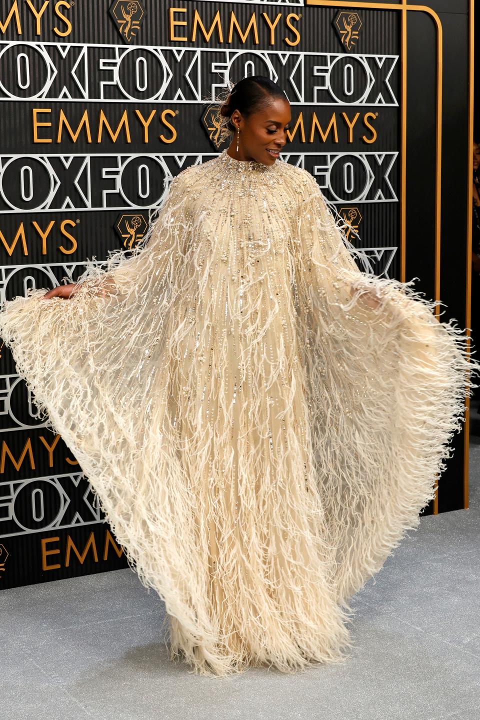 Issa Rae's Feathered 2024 Emmys Gown Has Me Singing, ‘I’m Like a Bird'