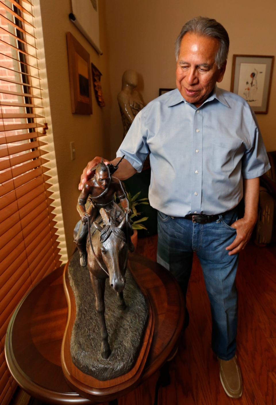 In this 2014 photo, Enoch Kelly Haney with his "Chickasaw Horse and Warrior" at his home in Norman.