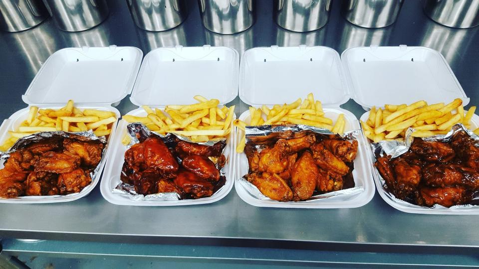 JammBar Wings has signature sauces including kickin' bourbon, mango habanero, sweet red chili and tangy gold.