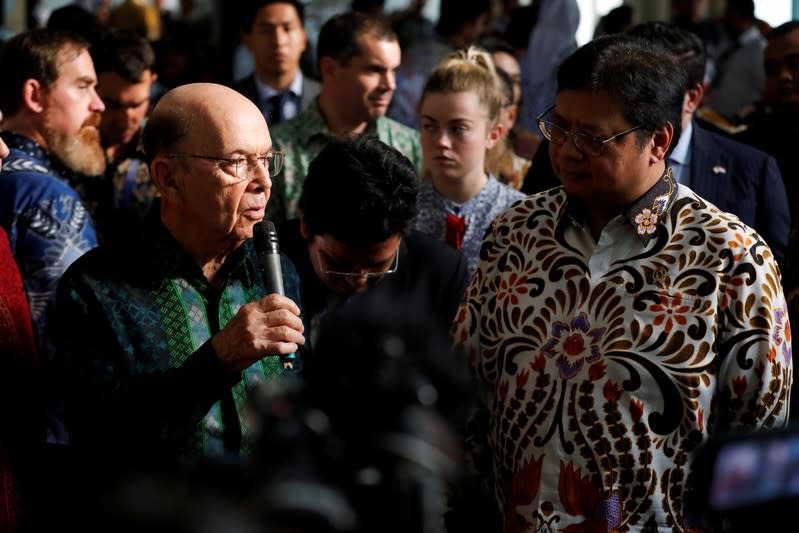 U.S. Commerce Secretary Wilbur Ross talks as Indonesia's Chief Economic Minister Airlangga Hartarto hears during a press briefing after their meeting in Jakarta