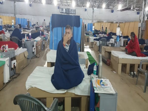 A patient during a yoga session conducted at Sardar Patel Covid Care Center on Saturday. [Photo/ANI]