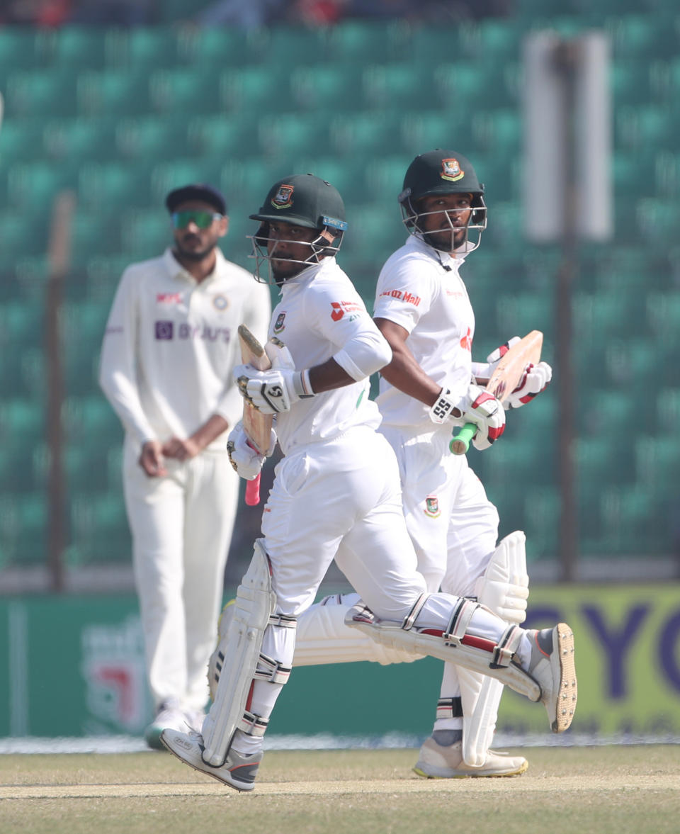 Bangladesh's Najmul Hossain Shanto,right, and Zakir Hasan run between wickets during the first Test cricket match on day four between Bangladesh and India in Chattogram Bangladesh, Saturday, Dec. 17, 2022. (AP Photo/Surjeet Yadav)