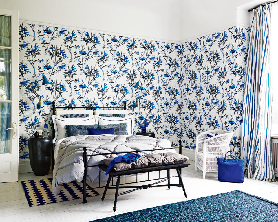 Brighten a monochrome room with royal blue accents