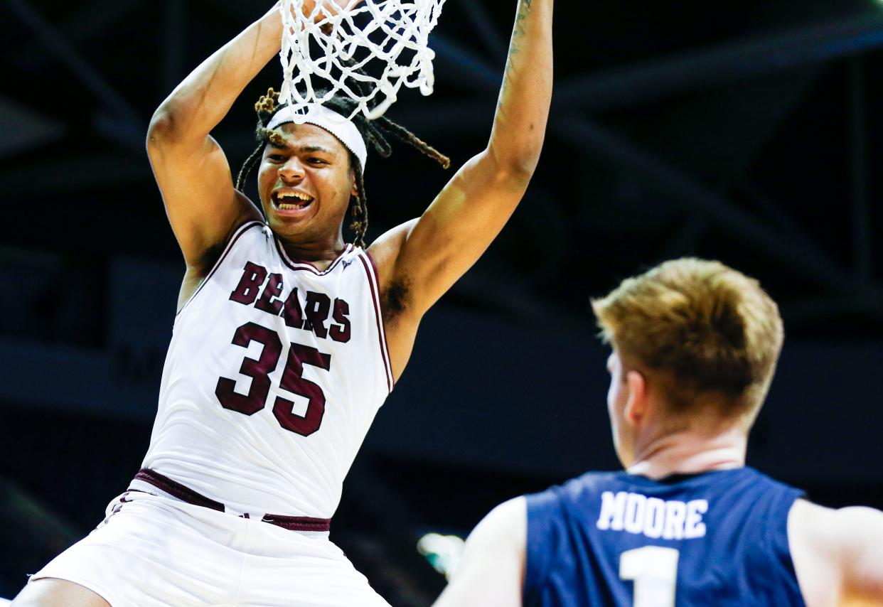 Missouri State sophomore N.J. Benson dunks the ball on the Oral Roberts Golden Eagles at Great Southern Bank Arena on, Monday, Nov. 13, 2023.