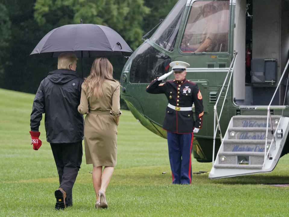 <p>President Donald Trump and first lady Melania Trump walk across the South Lawn of the White House in Washington to board Marine One helicopter for the short flight to nearby Andrews Air Force Base, Md., Saturday, Sept. 2, 2017. (Photo: Pablo Martinez Monsivais/AP) </p>