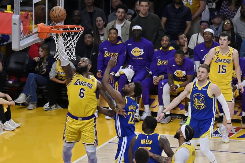 Los Angeles Lakers forward LeBron James scores against the Golden State Warriors in 2023. James surpassed 40,000 points Saturday night. Photo by Jim Ruymen/UPI