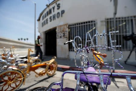 A customized Los Angeles Lakers inspired low rider bicycle is pictured outside Manny's bike shop in Compton, California U.S., June 3, 2016. Picture taken June 3, 2016. REUTERS/Mario Anzuoni