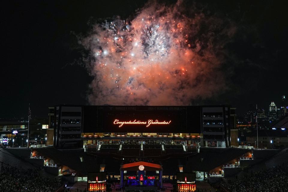 A fireworks display lights up Royal-Texas Memorial Stadium at the end of the 2023 University of Texas at Austin Commencement Ceremony on Saturday, May 6, 2023 in Austin.