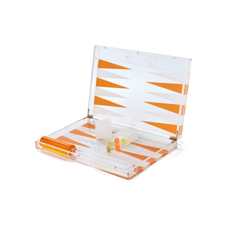 The recipient of this lucite backgammon set will thank you because once they’re done playing, they can use this beauty as unexpected decor. And just like that, you’ve given someone two gifts in one. Checkmate (wrong game, same idea).
SHOP NOW: Lucite backgammon set by Jayson Home, $275, goop.com.