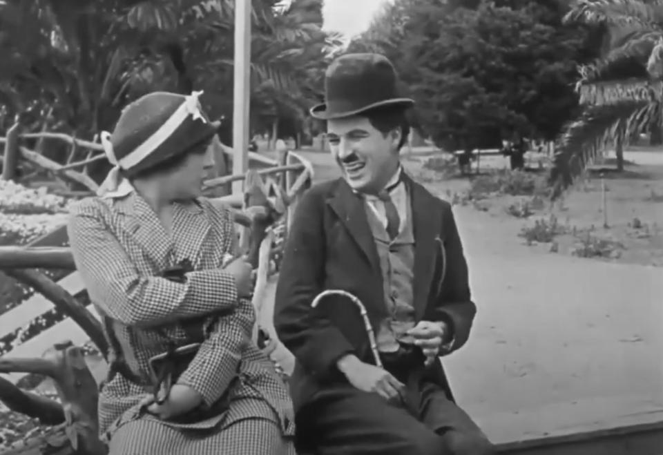 a scene from Charlie Chaplin's "By The Sea"