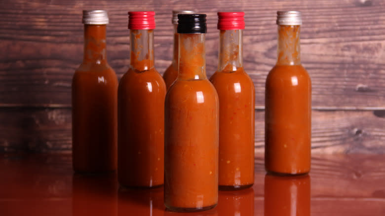 Bottles of hot sauce.