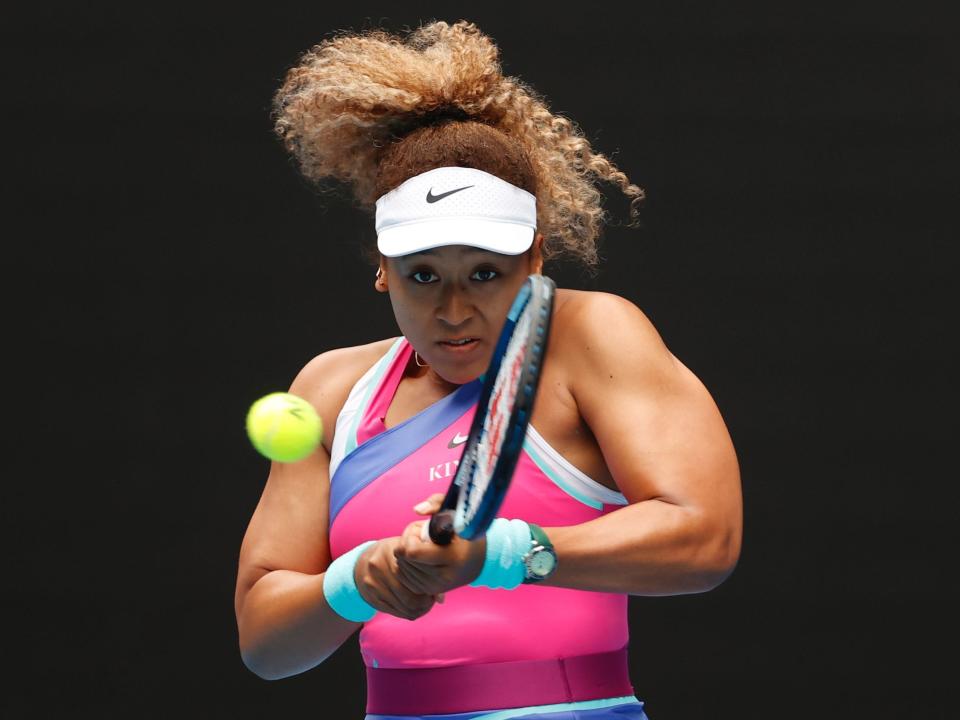 Naomi Osaka hits a backhand at the Australian Open.