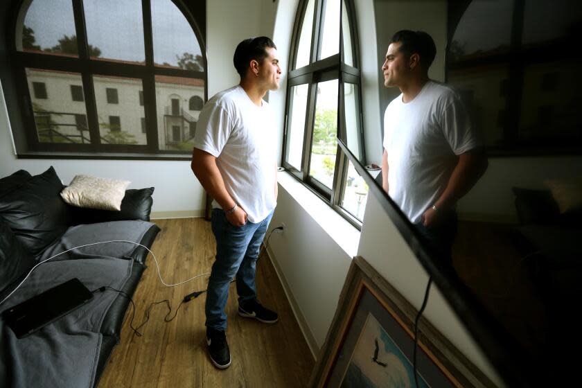 LOS ANGELES, CA - JUNE 14, 2023 - U.S. Army veteran Eddie Sotelo, 34, who was for homeless for almost a decade, stands inside his apartment on the VA Campus in Los Angeles on June 14, 2023. Sotelo spent months filling out paperwork before getting the housing he was promised as a veteran in Afghanistan. He served in Afghanistan from 2007 to 2012, doing 500+ missions in an 8 month period and suffers from Post Traumatic Stress Syndrome. "I didn't think I was coming out of this thing alive," Sotelo said about living on the streets. "I'm in the healing phase," he concluded. (Genaro Molina / Los Angeles Times)