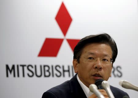 Mitsubishi Motors President and COO Tetsuro Aikawa speaks during a news conference at the company headquarters in Tokyo July 27, 2015. REUTERS/Toru Hanai