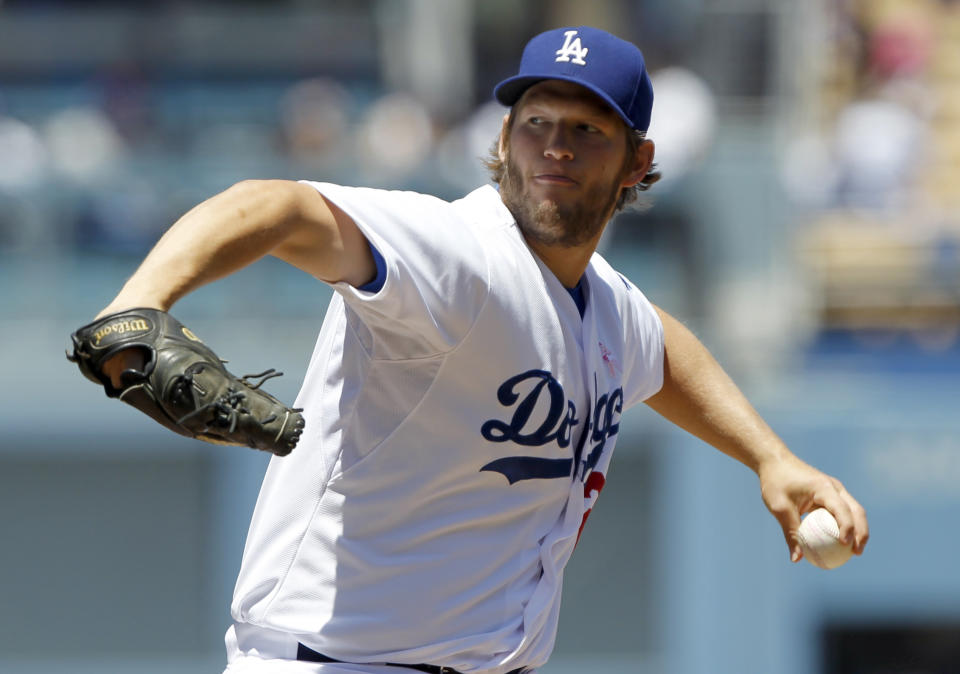 Los Angeles Dodgers starting pitcher Clayton Kershaw throws against the San Francisco Giants in the first inning of a baseball game on Sunday, May 11, 2014, in Los Angeles. (AP Photo/Alex Gallardo)