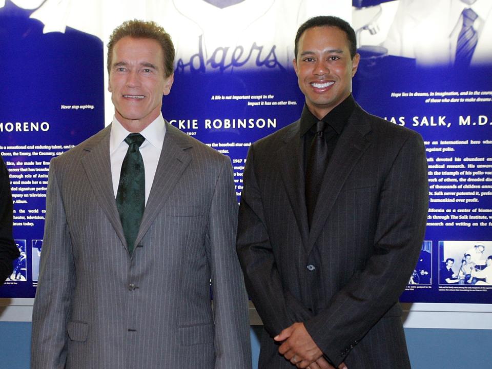 California governor Arnold Schwarzenneger, PGA golfer Tiger Woods pose for a photo during the 2007 California Hall of Fame induction ceremony at the California Museum on December 5, 2007 in Sacramento, California.