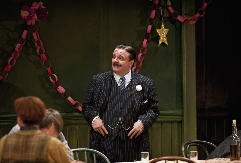 In this April 20, 2012, production photo provided by the Goodman Theatre in Chicago actor Nathan Lane, as Theodore “Hickey” Hickman, the quintessential purveyor and slayer of pipe dreams, performs in a scene in playwright Eugene O’Neill’s "The Iceman Cometh," directed by Robert Falls. The epic drama runs through June 17. (AP Photo/Courtesy of The Goodman Theatre, Liz Lauren)